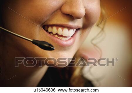 Woman with headset View Large Photo Image Stock Photograph - Woman with headset. Fotosearch
