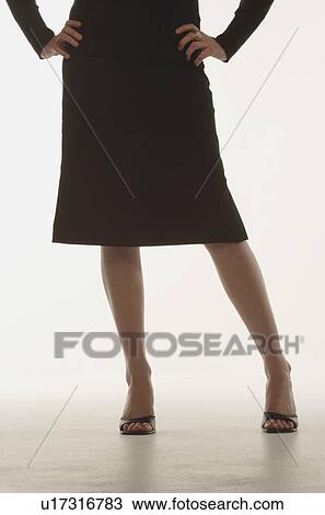 Stock Image - Woman with skirt. Fotosearch