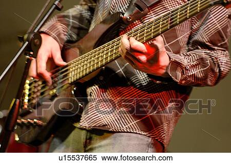 Bass guitar player View Large Photo Image Stock Photography - Bass guitar player. Fotosearch