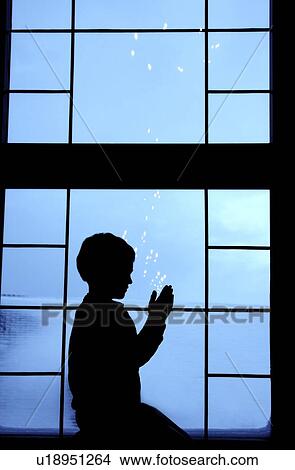 Child silhouette praying View Large Photo Image Picture - Child silhouette praying. Fotosearch