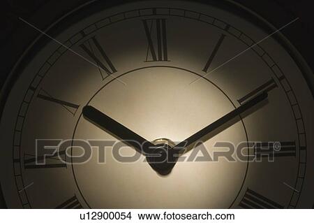 Close-up of a wall clock View Large Photo Image Picture - Close-up of a wall clock. Fotosearch