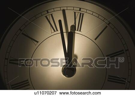 Stock Photo - Close-up of a wall clock. Fotosearch