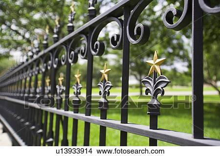 Fence with gold stars View Large Photo Image Picture - Fence with gold stars. Fotosearch