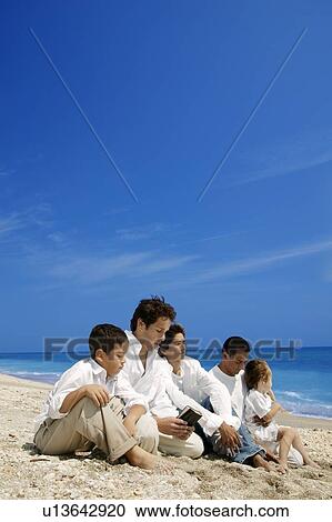 Stock Image - Group beach worship. Fotosearch