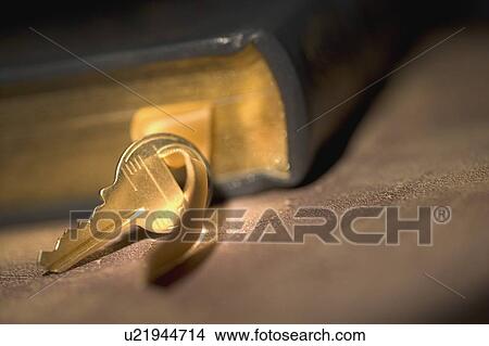 Key with a book View Large Photo Image Picture - Key with a book. Fotosearch