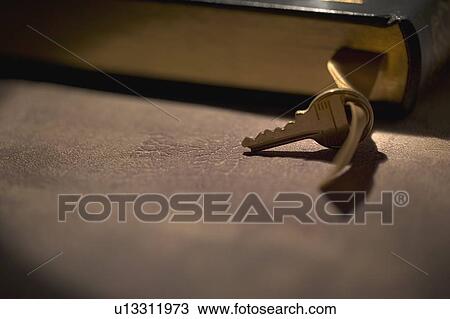 Key with a book View Large Photo Image Stock Image - Key with a book. Fotosearch