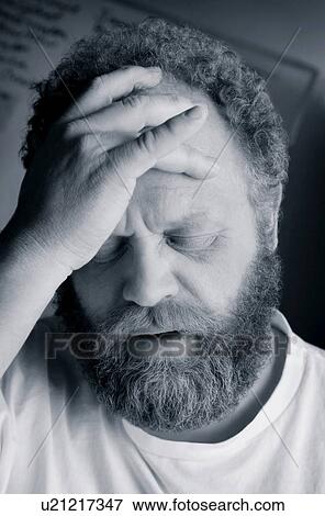 Stock Photo - Man feeling anxiety. Fotosearch