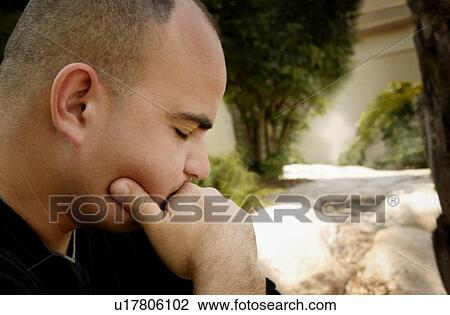 Man in deep thought View Large Photo Image Stock Image - Man in deep thought. Fotosearch
