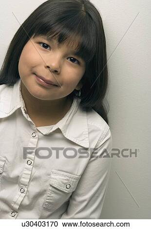 Portrait of a young girl View Large Photo Image Stock Image - Portrait of a young girl. Fotosearch
