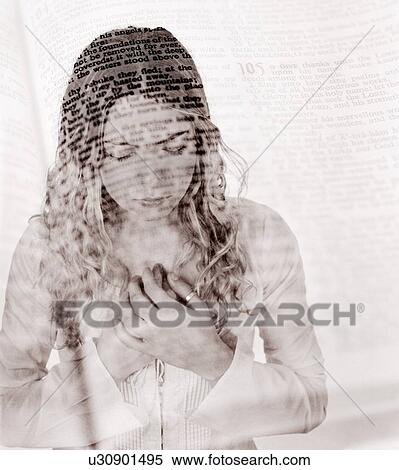 Stock Photography - Praying with Bible overlay. Fotosearch