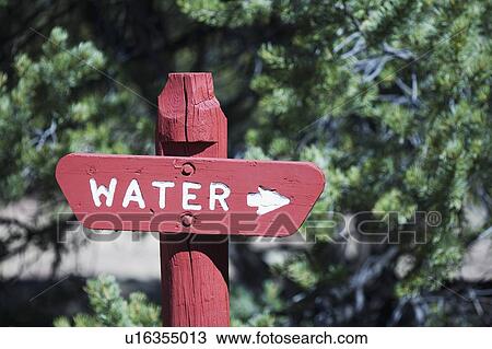 Stock Image - Sign pointing toward water. Fotosearch