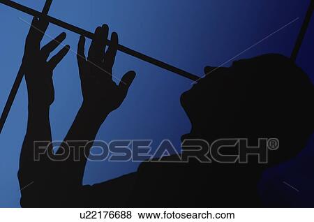 Stock Photo - Silhouette of a man. Fotosearch