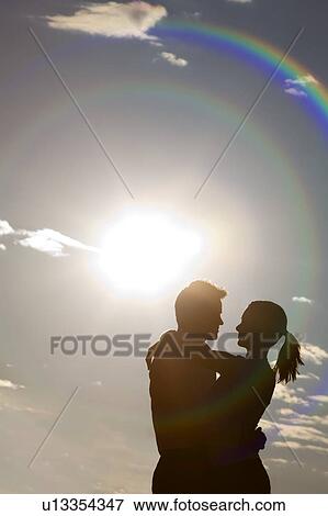 Stock Photo - Silhouetted embrace. Fotosearch