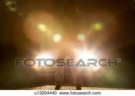 Standing in front of a car View Large Photo Image Stock Image - Standing in front of a car. Fotosearch