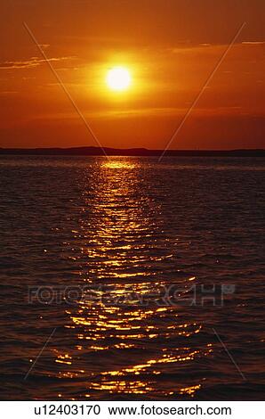 Sunrise, ocean reflection, Sinepuxent Bay View Large Photo Image Stock Image - Sunrise, ocean reflection, Sinepuxent Bay. Fotosearch
