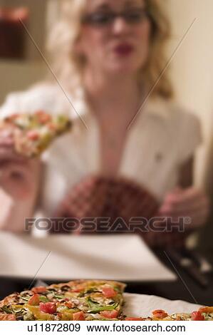 Woman dining View Large Photo Image Stock Photo - Woman dining. Fotosearch