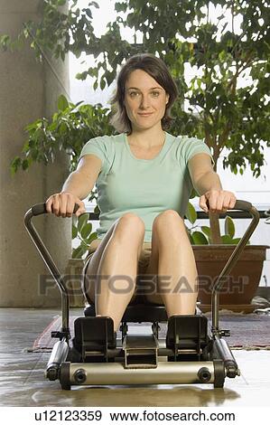 Stock Photo - Woman excerising. Fotosearch