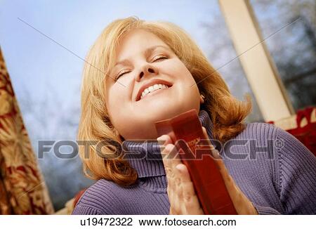 Woman holding bible View Large Photo Image Stock Image - Woman holding bible. Fotosearch