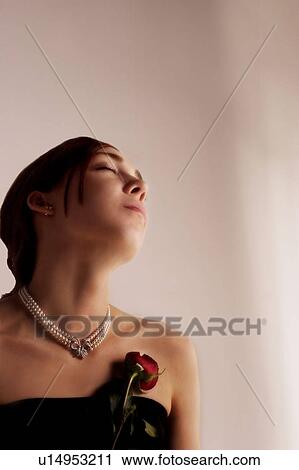 Stock Image - Young woman in love. Fotosearch