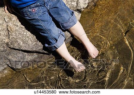 A little girls toes testing the water View Large Photo Image Stock Image - A little girls toes testing the water. Fotosearch