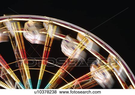 Amusement park ride blurred View Large Photo Image Stock Photo - Amusement park ride blurred. Fotosearch