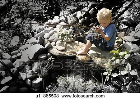 Boy fishing View Large Photo Image Stock Photo - Boy fishing. Fotosearch