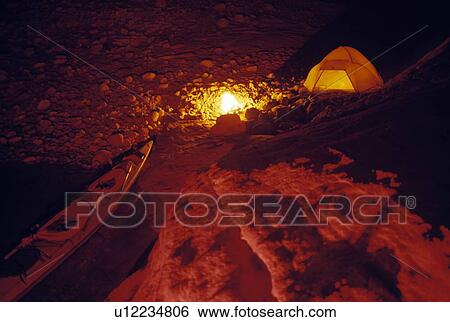 Campsite and kayak at night View Large Photo Image Stock Photograph - Campsite and kayak at night. Fotosearch