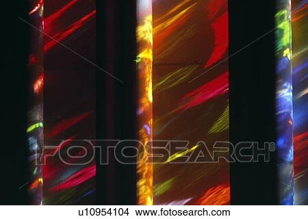 Picture - Columns with cast stained glass light. Fotosearch