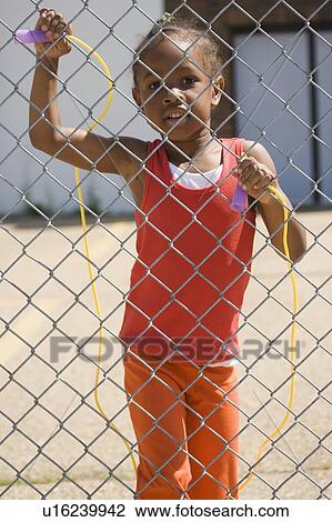 Stock Image - Girl with skip rope. Fotosearch