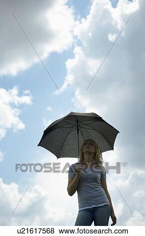 Stock Photo - Girl with umbrella. Fotosearch