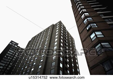 Low angle of apartment buildings View Large Photo Image Stock Image - Low angle of apartment buildings. Fotosearch
