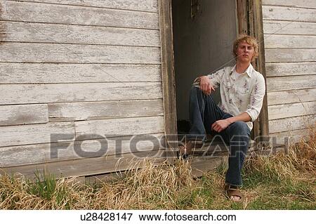 Stock Photo - Man in western setting. Fotosearch