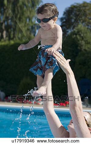 Mom and baby pool time View Large Photo Image Stock Photograph - Mom and baby pool time. Fotosearch