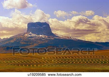 Stock Photography - Mountain and farmer's field. Fotosearch