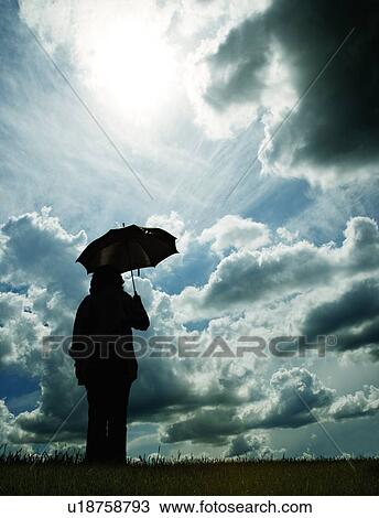 Stock Image - Outside in the storm. Fotosearch