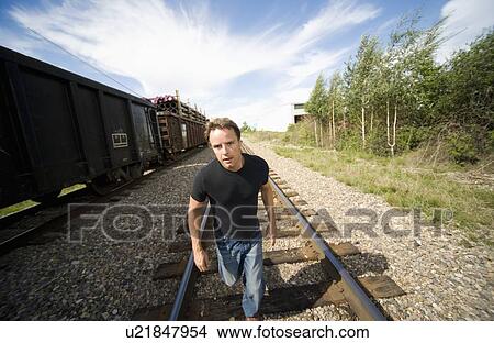 Picture - Running the tracks. Fotosearch