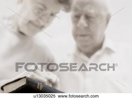 Senior couple praying View Large Photo Image Stock Photography - Senior couple praying. Fotosearch