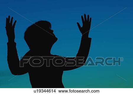 Woman in worship View Large Photo Image Picture - Woman in worship. Fotosearch