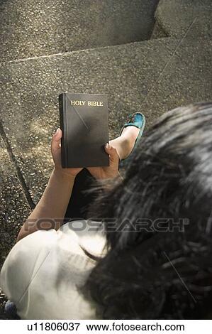 Woman Looking at Bible View Large Photo Image Stock Photo - Woman Looking at Bible. Fotosearch