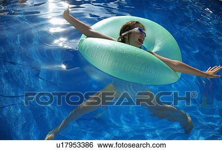 Young girl playing in water View Large Photo Image Stock Photograph - Young girl playing in water. Fotosearch