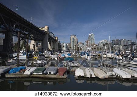 Harbour with cityscape in background View Large Photo Image Stock Image - Harbour with cityscape in background. Fotosearch
