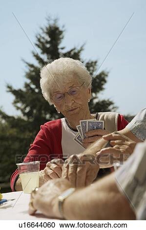 People playing cards View Large Photo Image Stock Image - People playing cards. Fotosearch