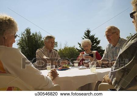 People playing cards View Large Photo Image Stock Image - People playing cards. Fotosearch