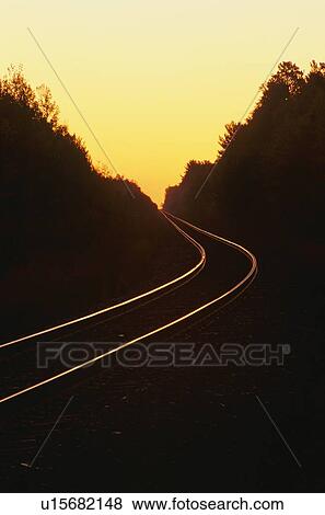 Railroad track at night View Large Photo Image Stock Photo - Railroad track at night. Fotosearch