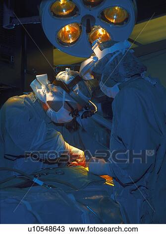 Stock Image - Surgery being preformed. Fotosearch