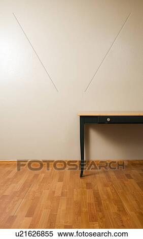 Stock Photography - Table on hardwood floor. Fotosearch