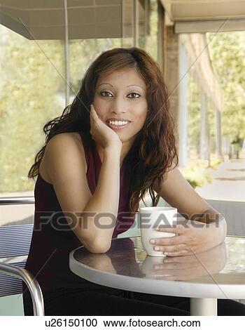 Woman having a coffee View Large Photo Image Stock Image - Woman having a coffee. Fotosearch