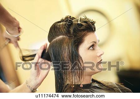 Woman having her hair cut View Large Photo Image Picture - Woman having her hair cut. Fotosearch
