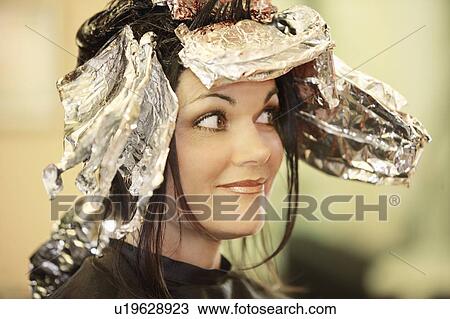 Woman having her hair dyed View Large Photo Image Stock Image - Woman having her hair dyed. Fotosearch