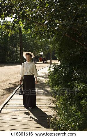 Stock Photograph - Woman in period costume. Fotosearch